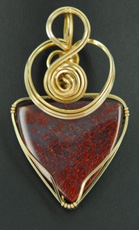 red agatized dinosaur bone 14k gold-filled wire wrapped pendant
