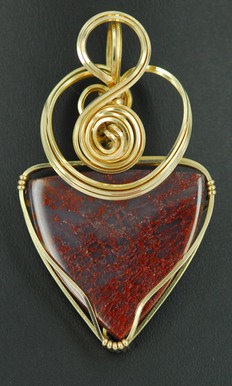 translucent red agatized dinosaur bone wire wrapped sculpted 14k gold filled cab cabochon pendant jewelry